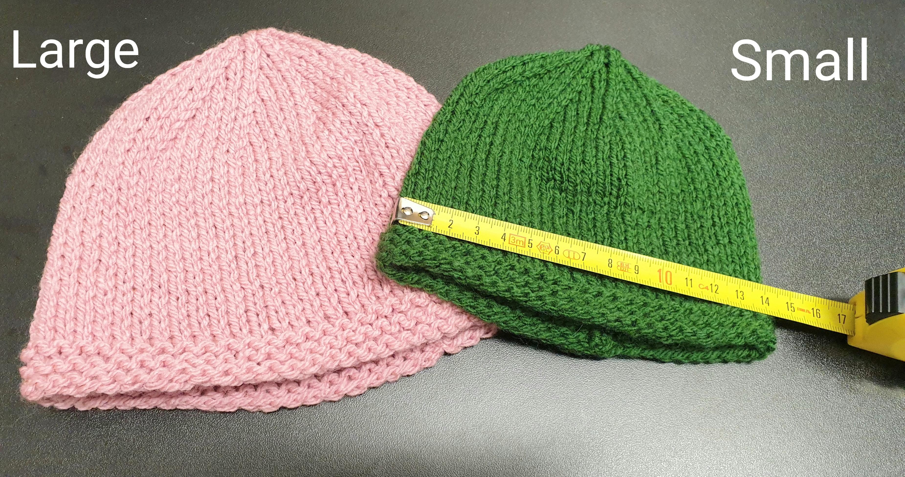 Pink Beanie and green beanie 